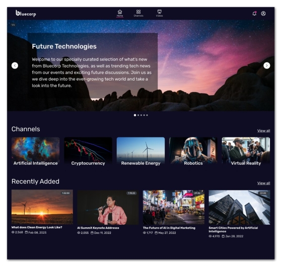 The image shows the homepage of the Bluecorp website, featuring the video library with several channels and videos.