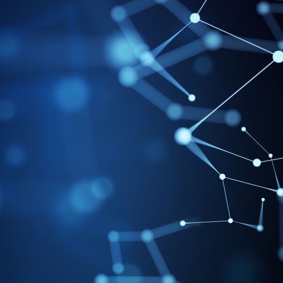 A blue background with white dots and lines resembling a network or web structure.
