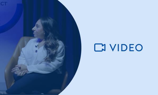 A woman is sitting on a chair, and a video logo is on the right side.