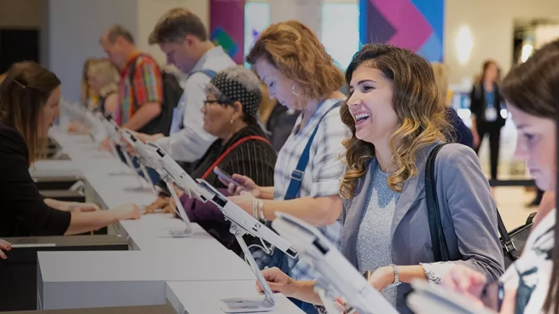 Cvent Connect 2019 attendees line up to check in at registration.