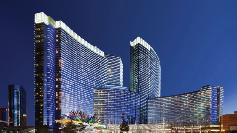 ARIA Resort & Casino, a hotel in Las Vegas, Nevada, with night view and a colorful sculpture.