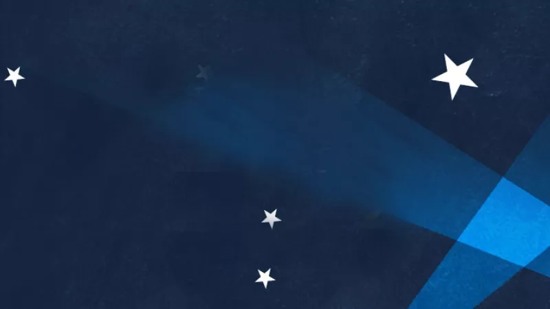 Blue sky with white stars and a blue star in the center on a dark background.