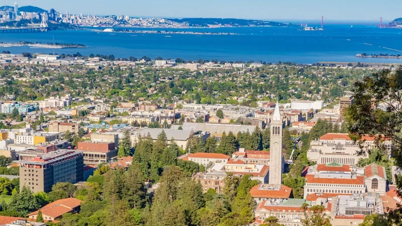Aerial view of the UC Berkeley campus with the Campanile tower in the center.