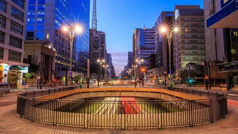 Evening cityscape with traffic on a curved road in Buenos Aires, Argentina.