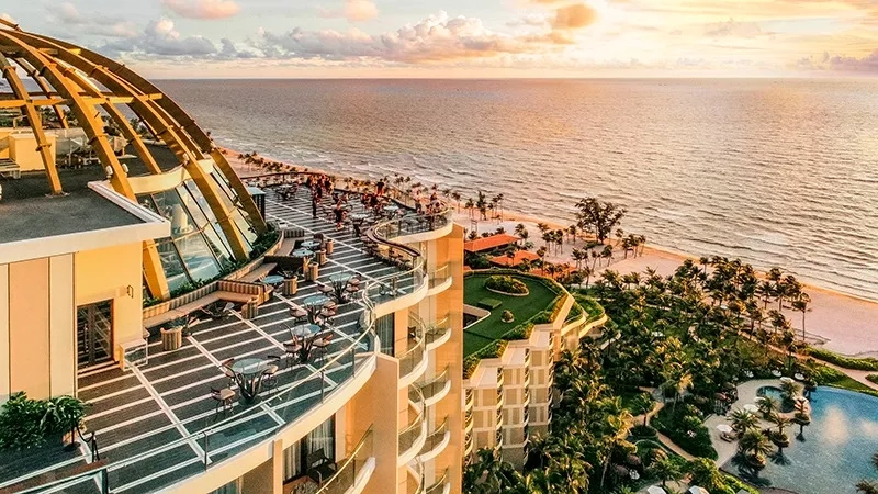 An aerial view of the oceanfront pool and ocean view at INK 360, Vietnam.