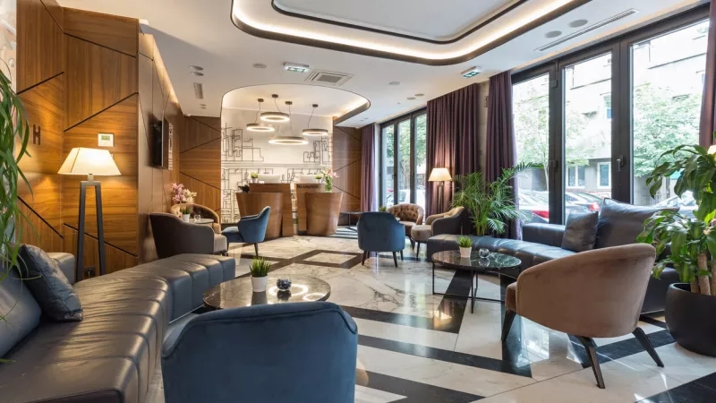 Interior view of empty hotel lobby during shoulder season, a prime time for renovation projects.