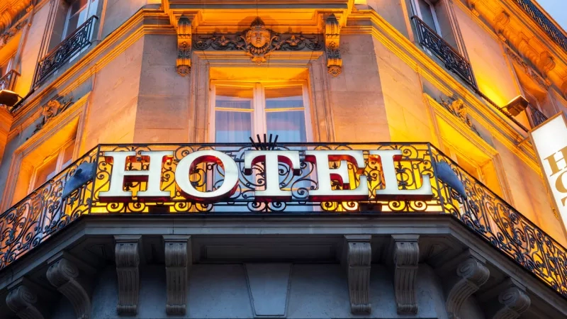Exterior view of the sign at the front of a hotel.