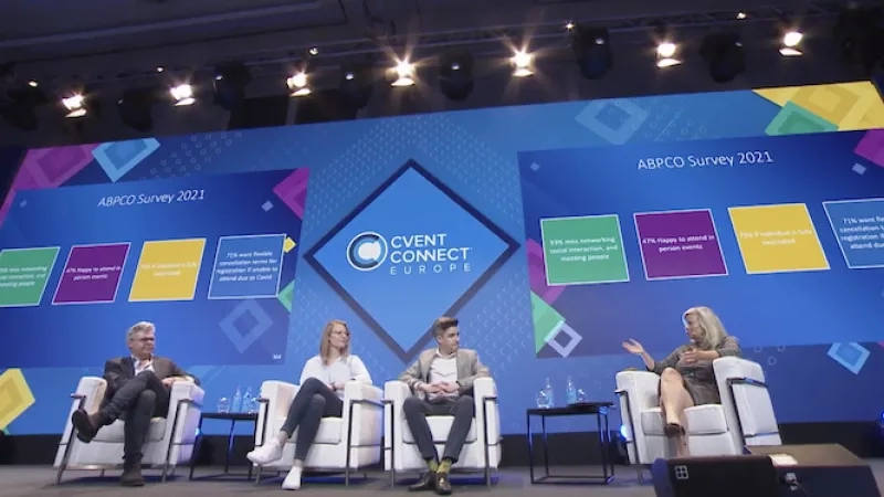 Four people are sitting on a stage in front of a large screen that says 'ABPCo Survey 2021'.
