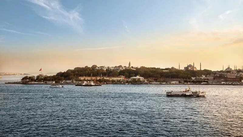 JW Marriott Hotel Istanbul Bosphorus, Turkey - Bosphorus view at sunset with a boat in the water.