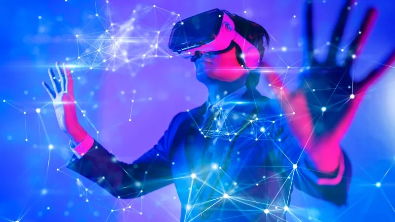 Metaverse digital cyber world technology, man with virtual reality VR goggle playing AR augmented reality game.