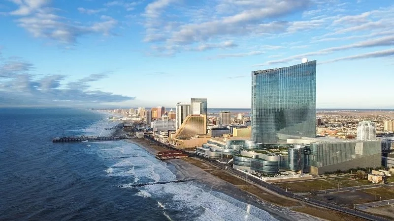 Oceanfront view of AC Ocean Walk, showcasing modern architecture and scenic coastal landscape.
