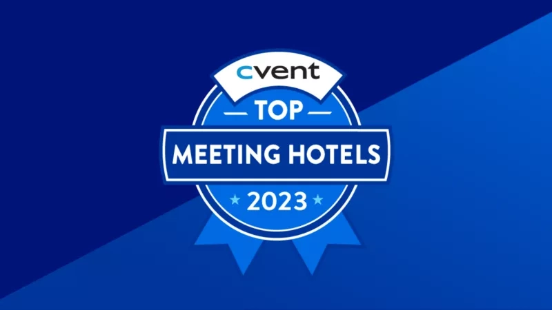 Cvent Top Meeting Hotels 2023 award badge on a blue background.