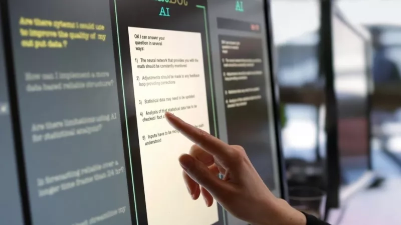 A hand points to a screen showing a question and several answers on an Amazon AI system.