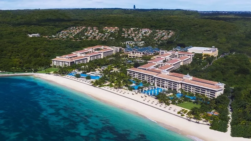 Aerial view of the beach and Mulia Bali, a luxury resort in Nusa Dua, Bali.