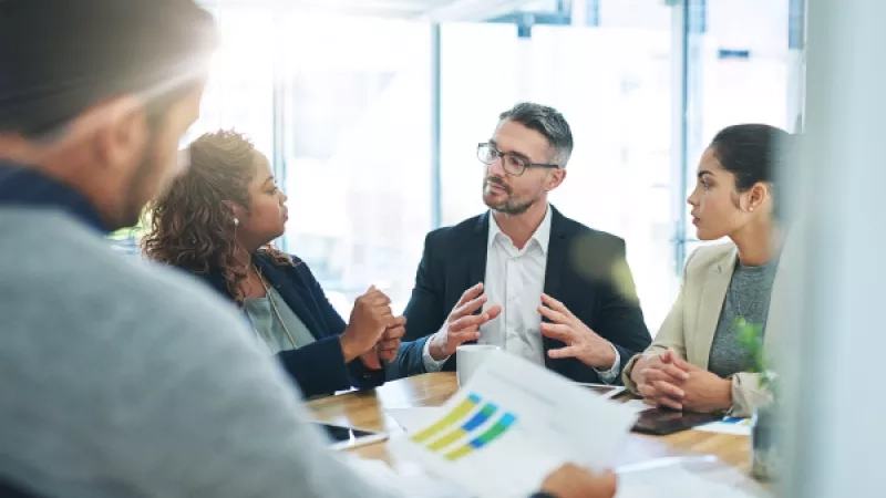 Business people discussing in a meeting at the table in the office.