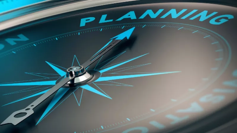 A compass with the words planning, design, architecture, landscaping, and ambiance written on it.