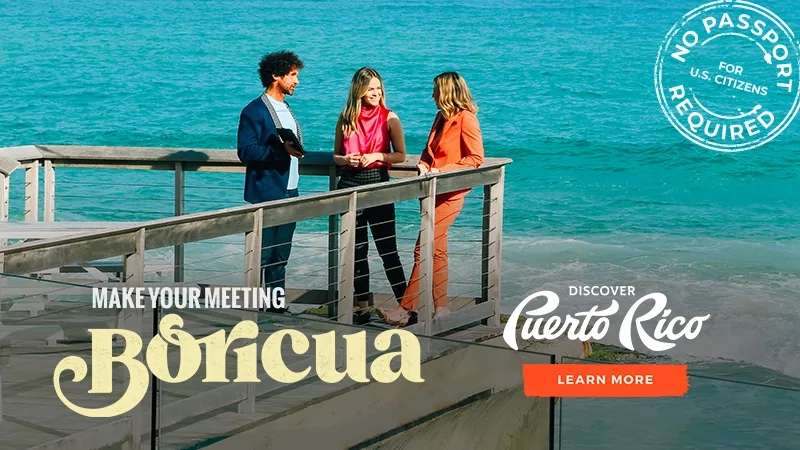 Three people on a deck looking out over the water with text "Discover Puerto Rico"