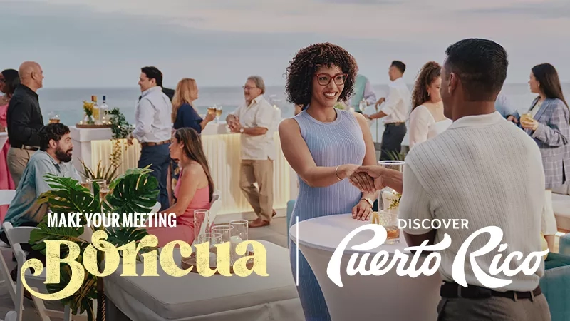 Make your meeting Boricua Discover Puerto Rico as seen from a top-angle view with a group of people.
