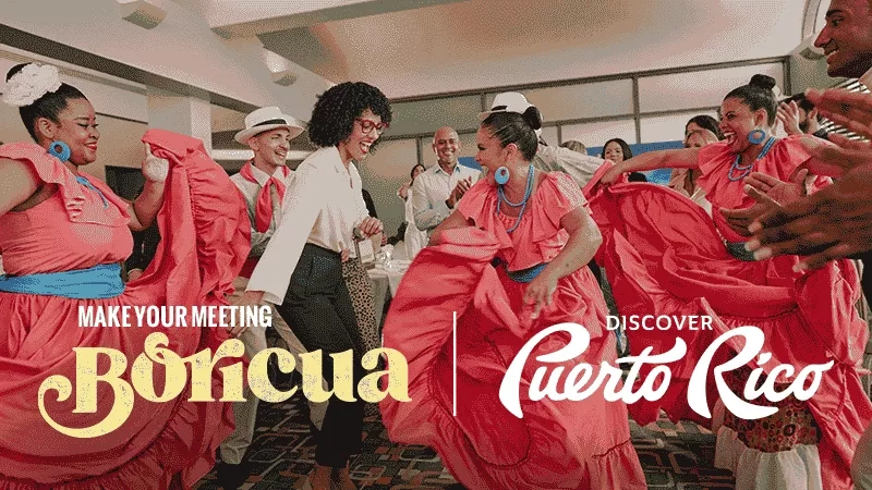 Group of people dancing in a meeting room with the words Make your meeting in Bonciua Puerto Rico.