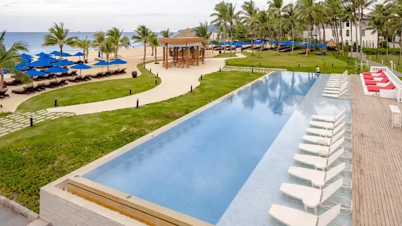 Poolside cabanas and beach view at Shangri-La Boracay, Philippines, an outdoor resort view.
