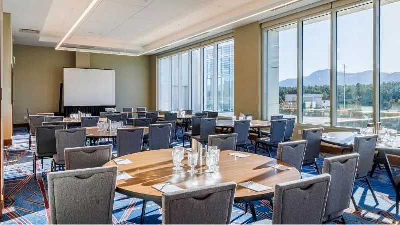 A conference room at The Westin Lake Las Vegas Resort & Spa with tables and chairs.