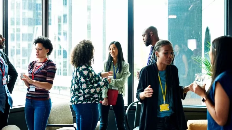 People talking at an event