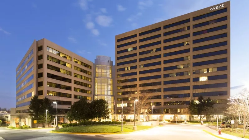 Cvent HQ in McLean, Virginia, is a building with an object, text, architecture, landscaping, and ambiance.