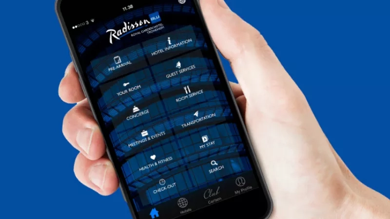 Radisson Blu Hotel, Royal Garden, Tromso: hand holding a phone with the Radisson Blu app on the screen