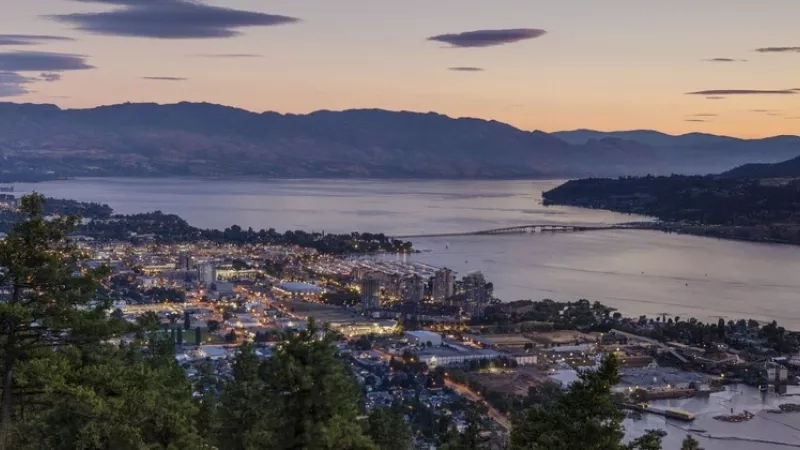 Panoramic view of Kelowna from Knox mountain at sunset, British Columbia, Canada.