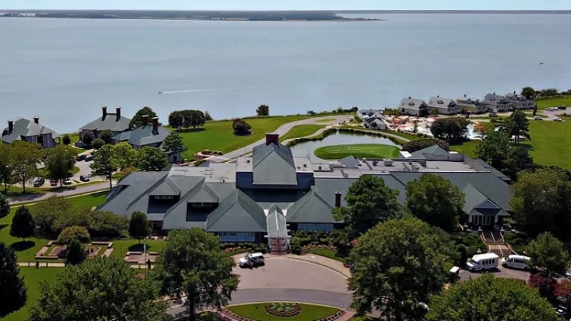 Kingsmill Resort from above, showing its architecture, landscaping, and the sea in the background.
