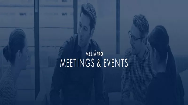A group of people sitting in a room with "Meetings & Events" text on a blue background.