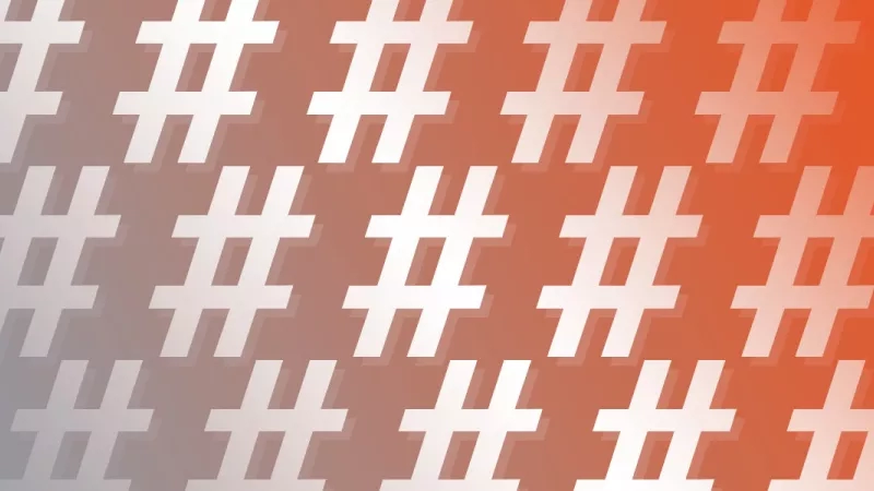 An orange and gray background with a white hashtag symbol in a grid-like pattern for Beyond the Hashtag.