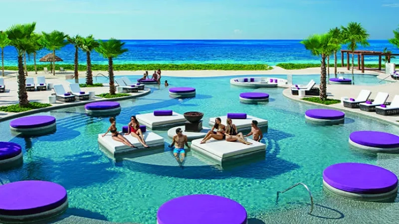 Group of people in the pool at Breathless Cancun Soul Resort & Spa, an adult-only resort.