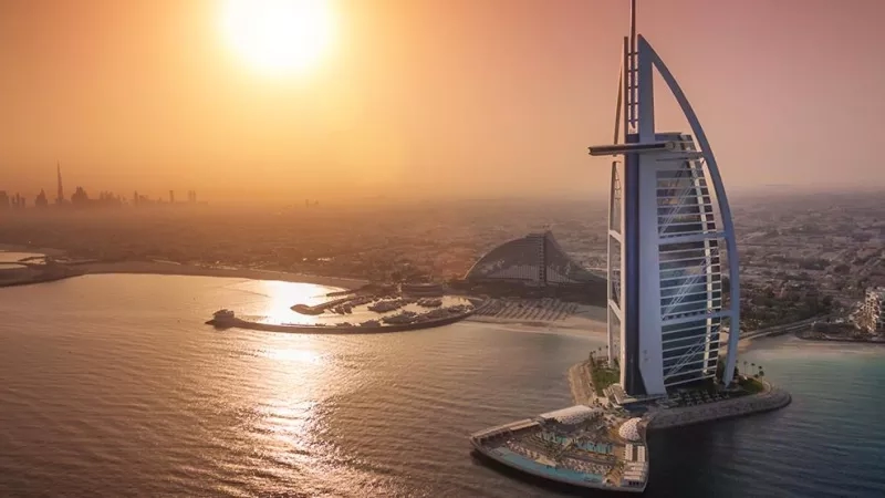 Burj Al Arab Jumeirah Terrace Exterior 2 Hero, sunset, ocean, architecture, skyline, luxury, travel, Dubai.
