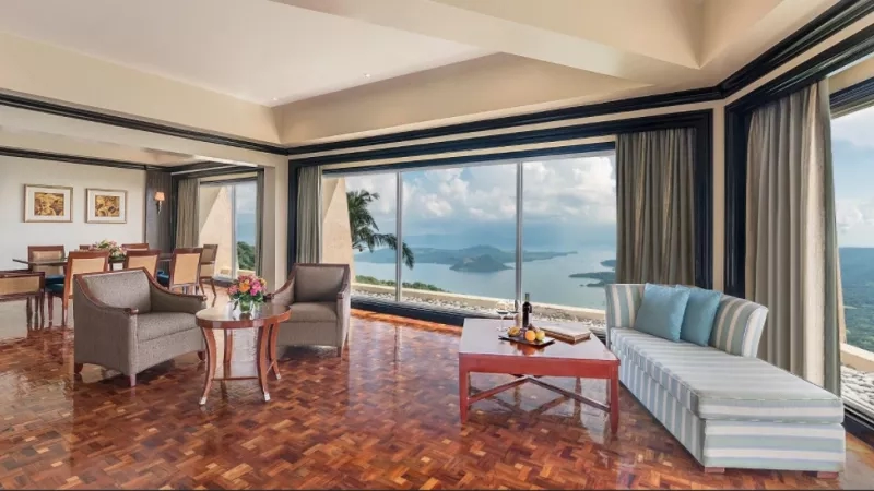 A room with large windows at The Manor at Camp John Hay in Baguio, Philippines.