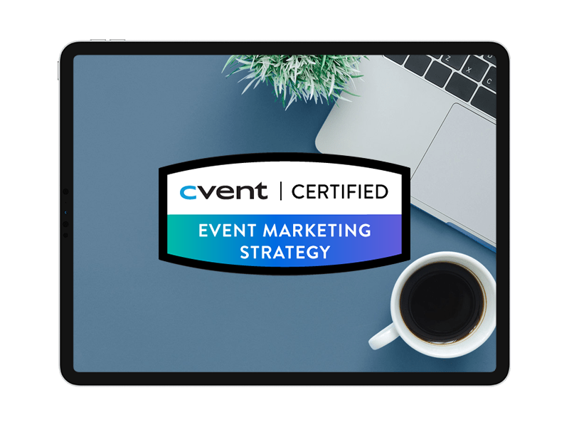 A laptop displaying a certification badge for event marketing strategy next to a cup of coffee.
