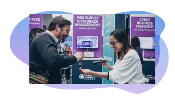 Woman taking a survey on an onsite device at Cvent Connect Europe 2023.