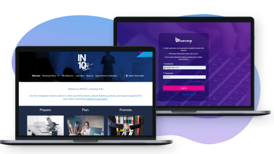 Laptops with login screen and meeting hub page open on the screens.