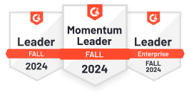 G2 Badges 2024 displaying 'Momentum Leader Fall 2024' and 'Leader Fall 2024 Enterprise'.